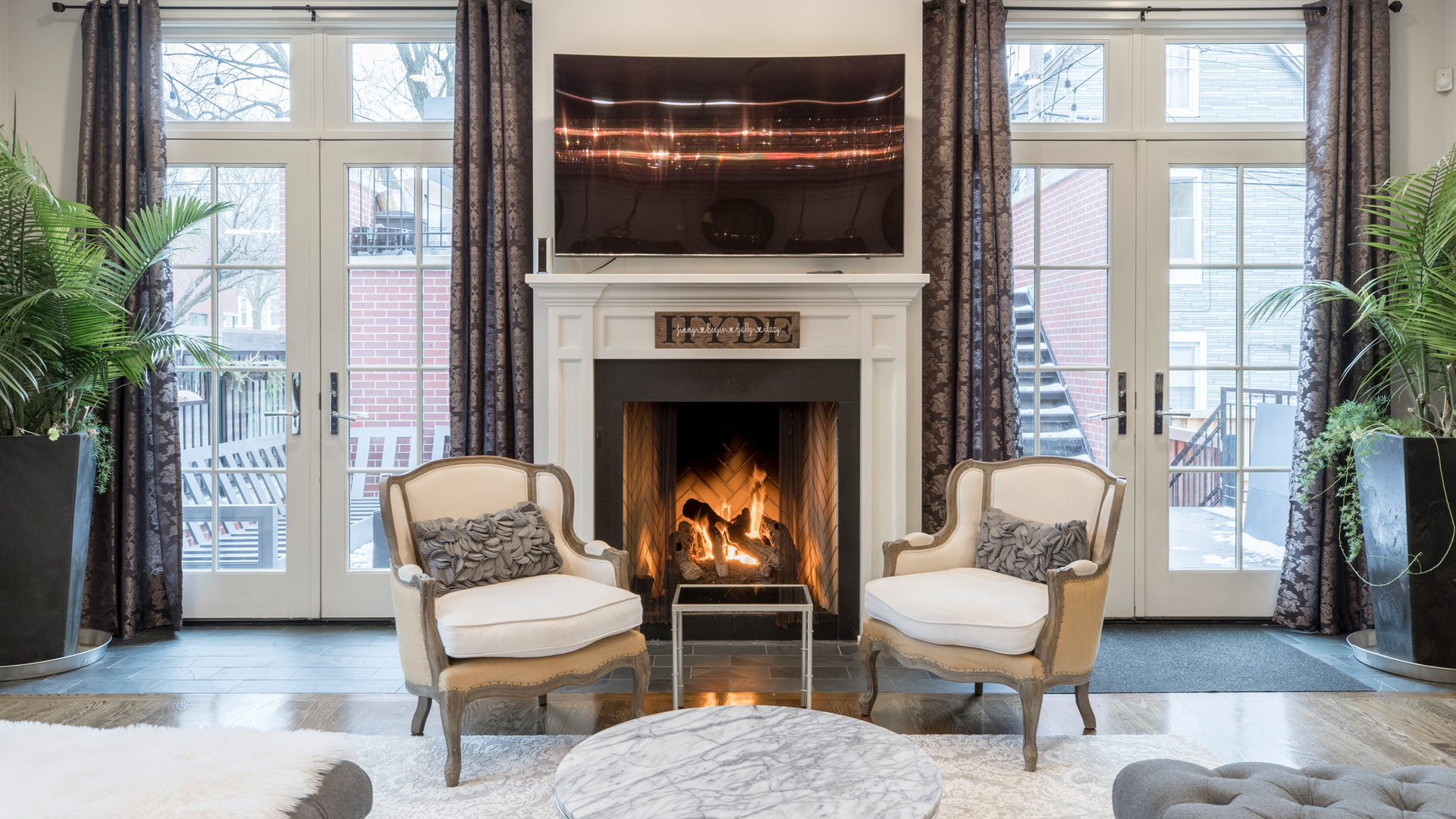 Contemporary residential interior overlooking an estate landscape